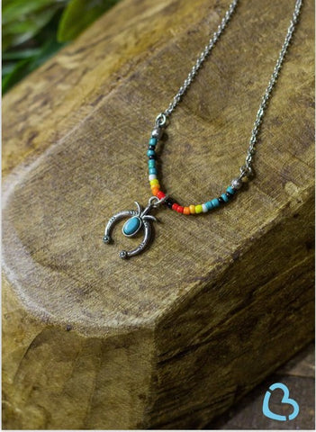 The Ruidoso Beaded Anklet with Squash Blossom Charm